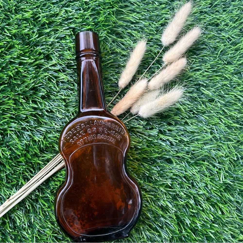 GUITAR SHAPED ANTIQUE VINTAGE DARK BROWN BOTTLE FROM PROHIBITION